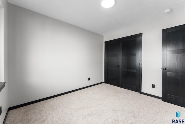 unfurnished bedroom with carpet