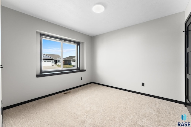 view of carpeted spare room