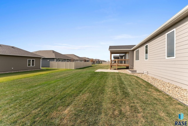 view of yard featuring a deck