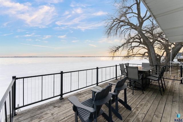 deck at dusk with a water view