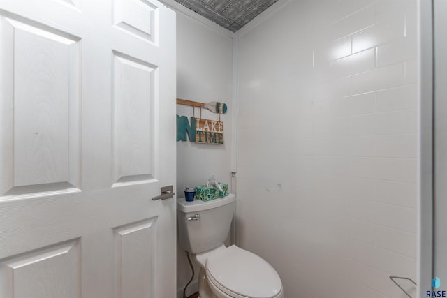 bathroom featuring toilet