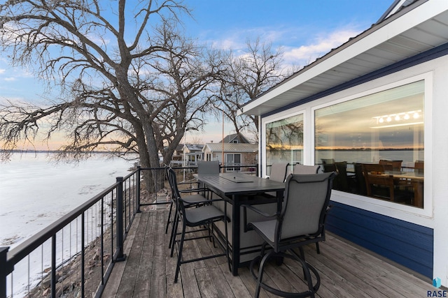 view of snow covered deck