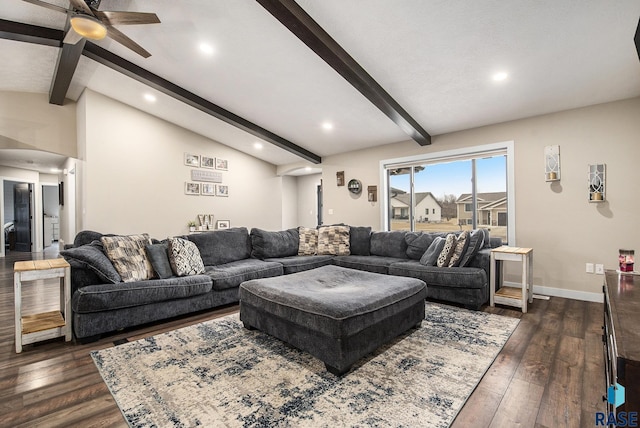 living area with lofted ceiling with beams, ceiling fan, baseboards, and dark wood-style flooring