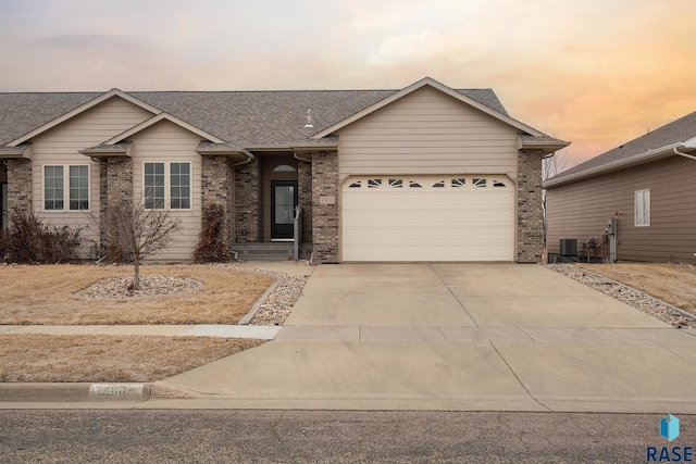 ranch-style home with a garage