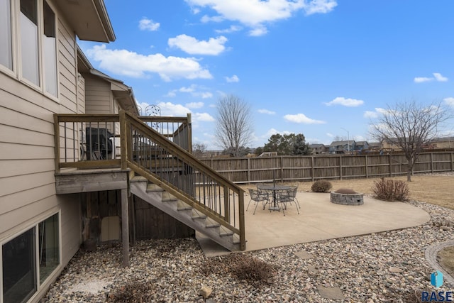 view of patio / terrace with an outdoor fire pit