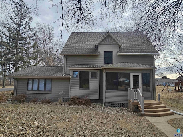 view of front of home featuring a playground