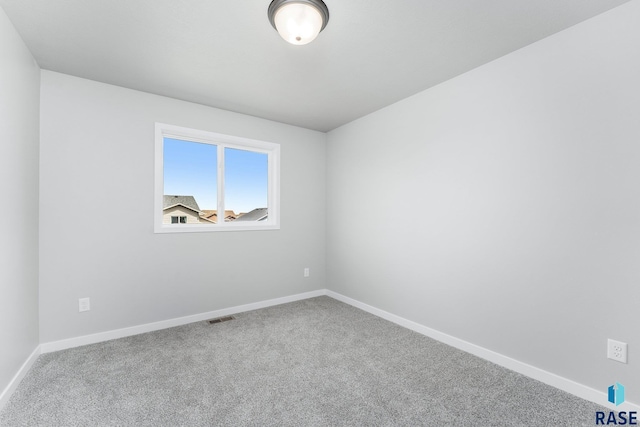 unfurnished room with carpet