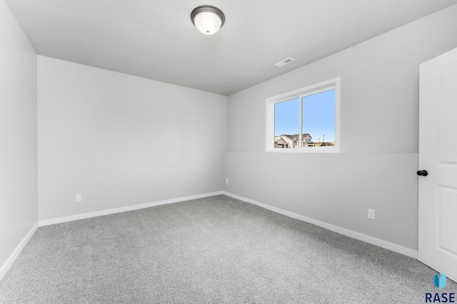 view of carpeted spare room