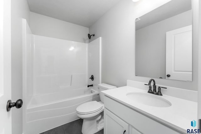 full bathroom featuring vanity, tile patterned floors,  shower combination, and toilet