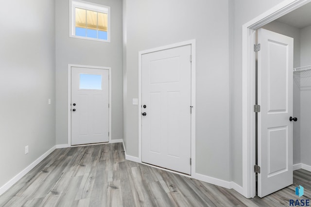 entrance foyer with light hardwood / wood-style floors