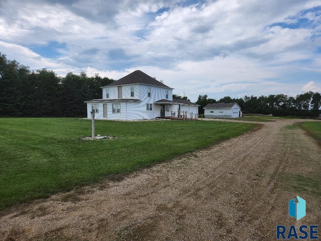 view of home's exterior with a lawn