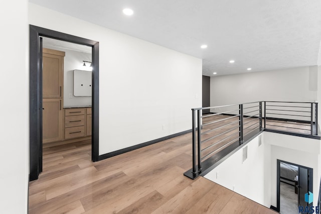 hall featuring light hardwood / wood-style floors