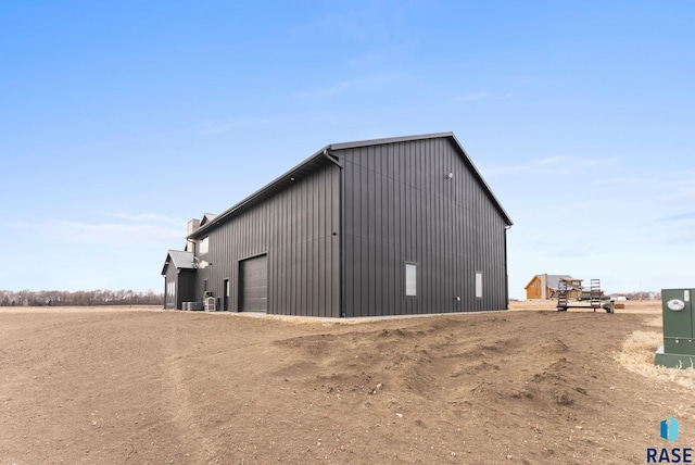 view of outbuilding with a garage