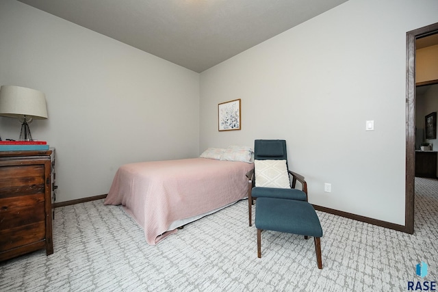 bedroom with light carpet