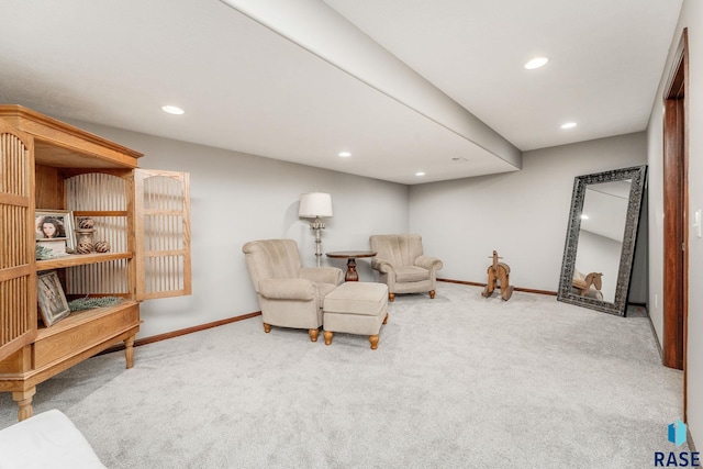 sitting room featuring carpet