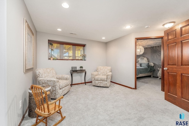 sitting room with light carpet