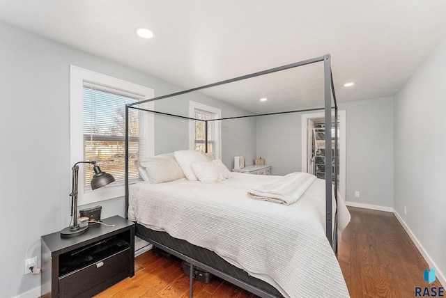 bedroom featuring hardwood / wood-style flooring