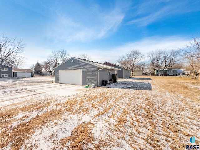 view of property exterior featuring a garage