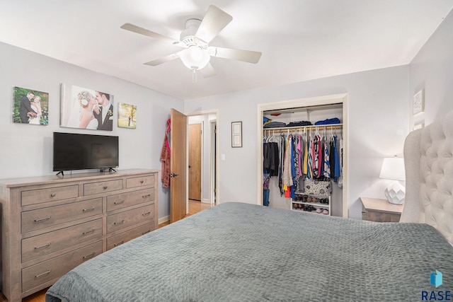 bedroom featuring ceiling fan and a closet