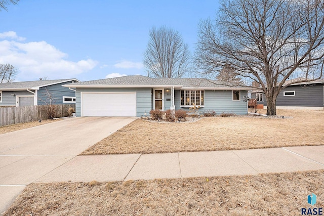 single story home featuring a garage