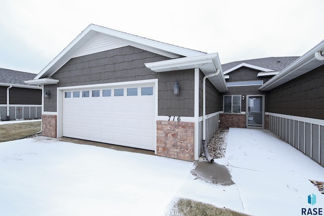 view of front of property featuring a garage