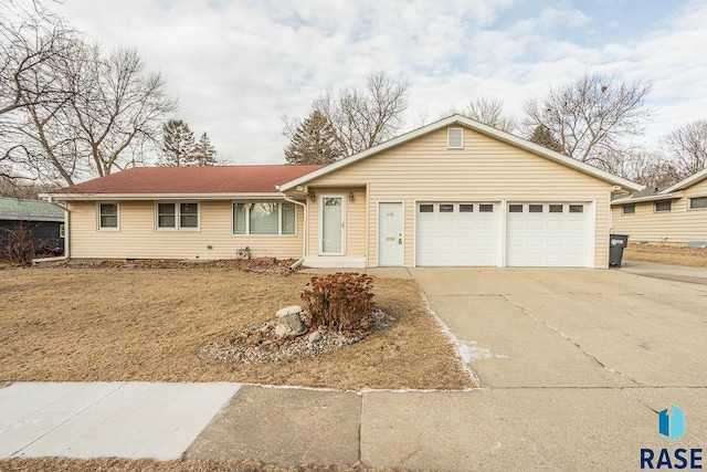 single story home with a garage