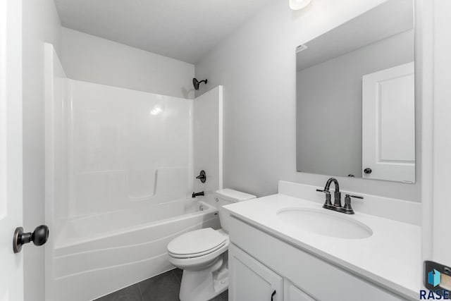 full bathroom featuring tile patterned flooring, vanity, toilet, and washtub / shower combination