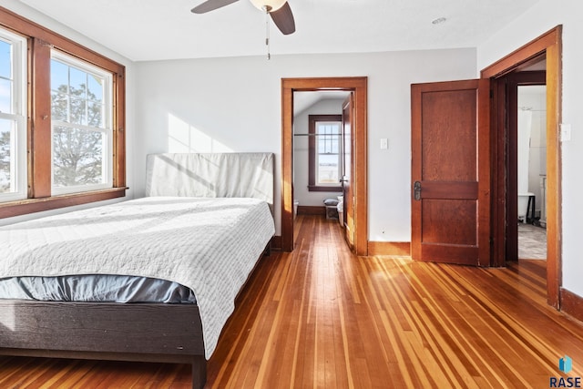 bedroom featuring hardwood / wood-style floors and ceiling fan