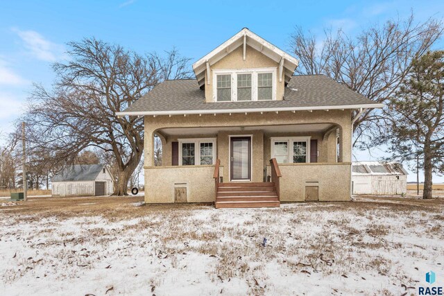 bungalow-style home with covered porch