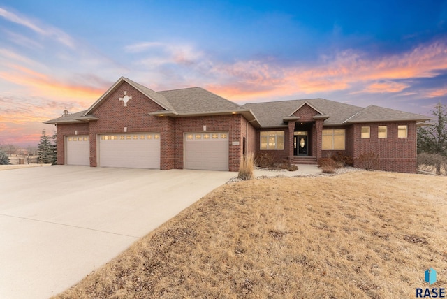 prairie-style house featuring a garage