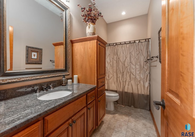 full bathroom featuring vanity, toilet, tile patterned flooring, and shower / tub combo