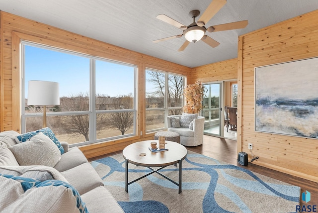 sunroom / solarium with ceiling fan