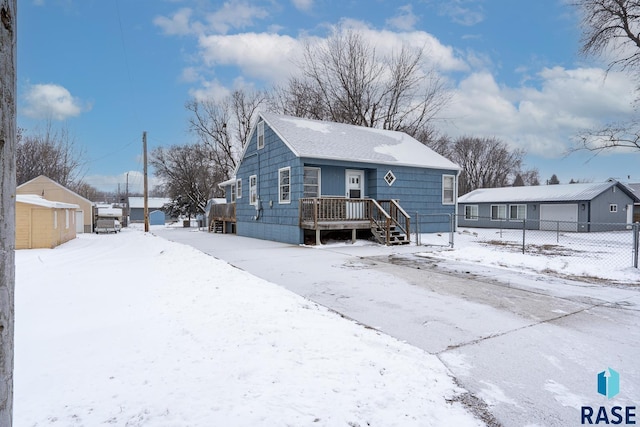 view of front facade featuring a shed