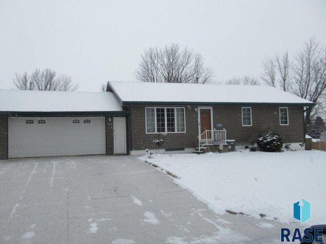 single story home featuring a garage