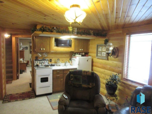 kitchen featuring plenty of natural light, wooden ceiling, rustic walls, and white stove