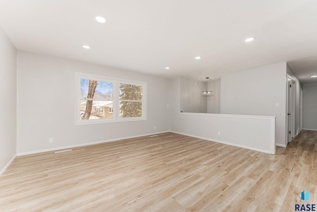 empty room featuring light hardwood / wood-style floors