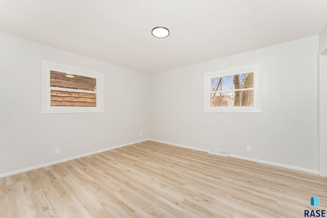 empty room featuring light wood-type flooring