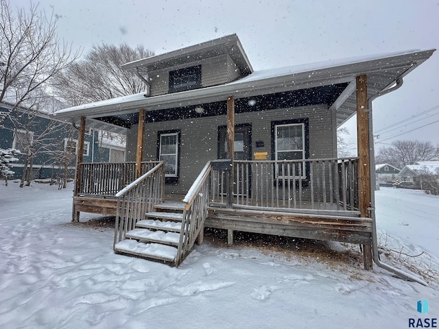 view of front of home featuring covered porch