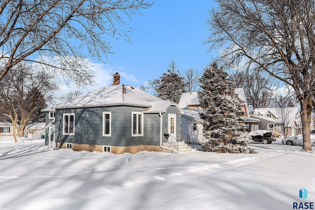 view of snow covered property