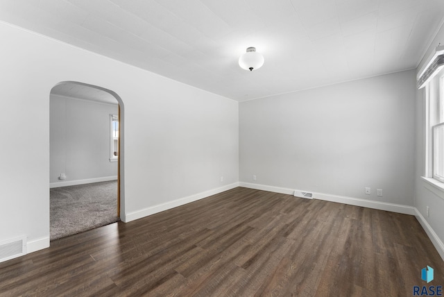 empty room featuring dark hardwood / wood-style floors