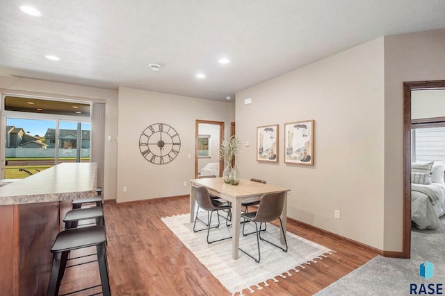 dining space featuring light hardwood / wood-style flooring