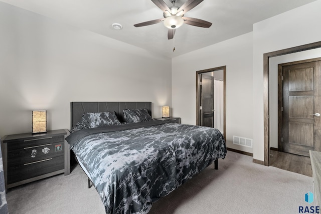 carpeted bedroom featuring ceiling fan