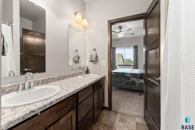 bathroom featuring ceiling fan and vanity