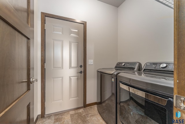 laundry room featuring independent washer and dryer