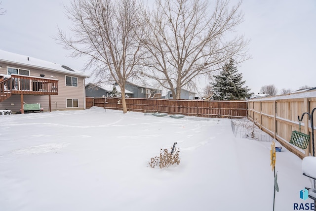 view of yard covered in snow