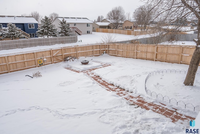 view of yard covered in snow