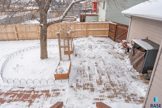 view of yard covered in snow