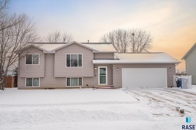 split level home featuring a garage