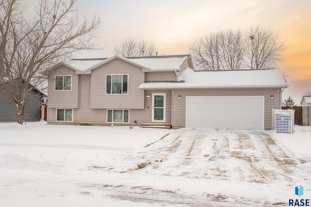 split level home with a garage