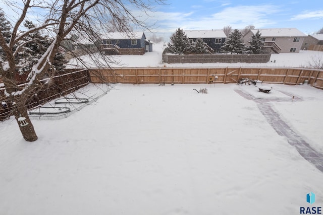 view of snowy yard